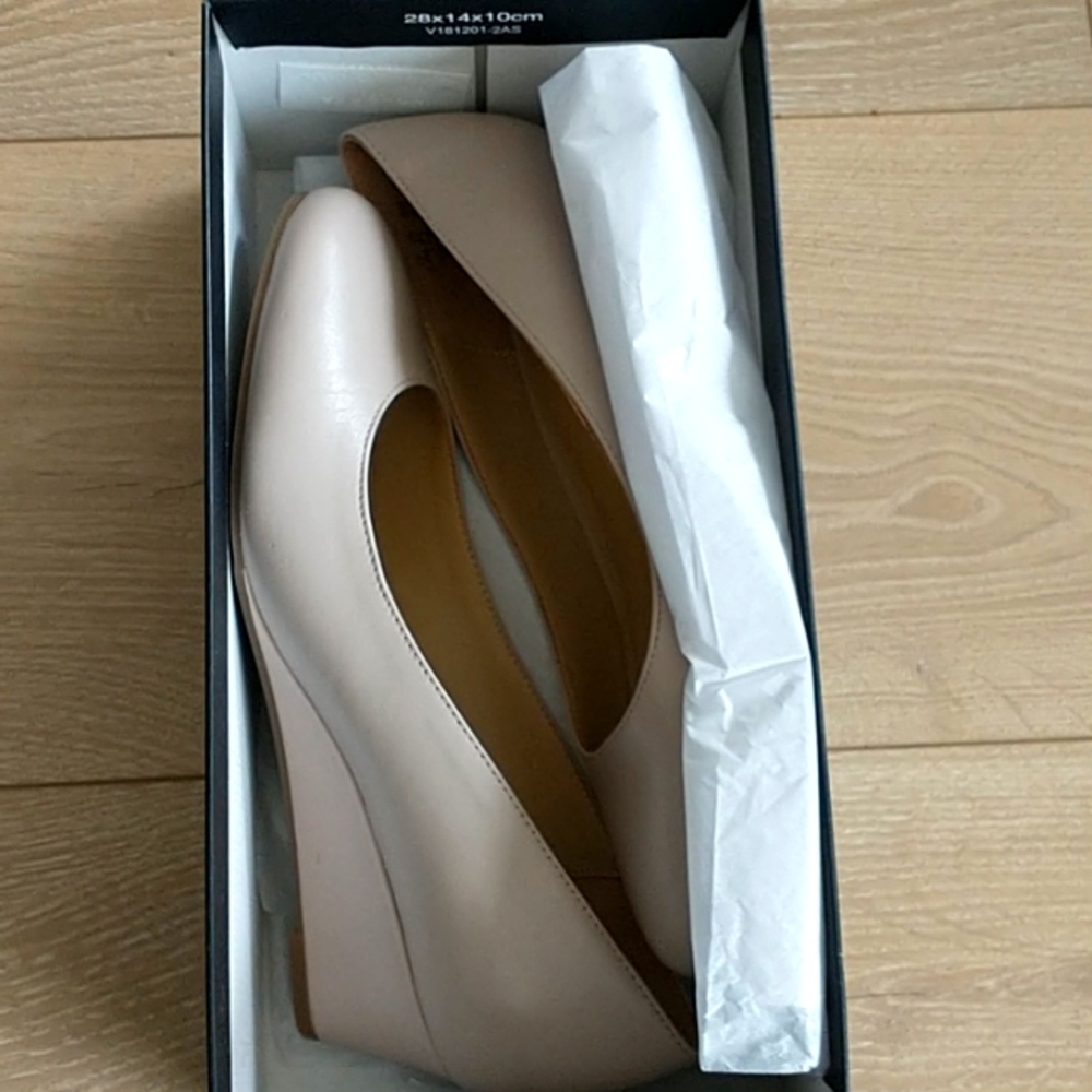 Elegant Cream Wedge Heels